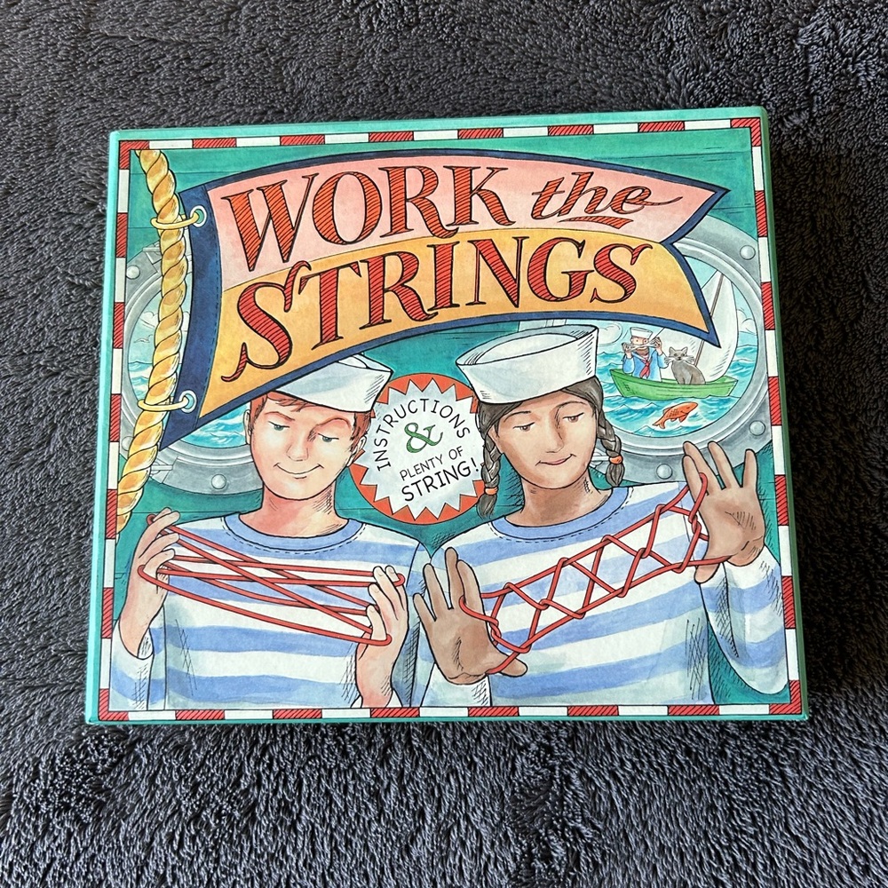NWOT Work the Strings (game)